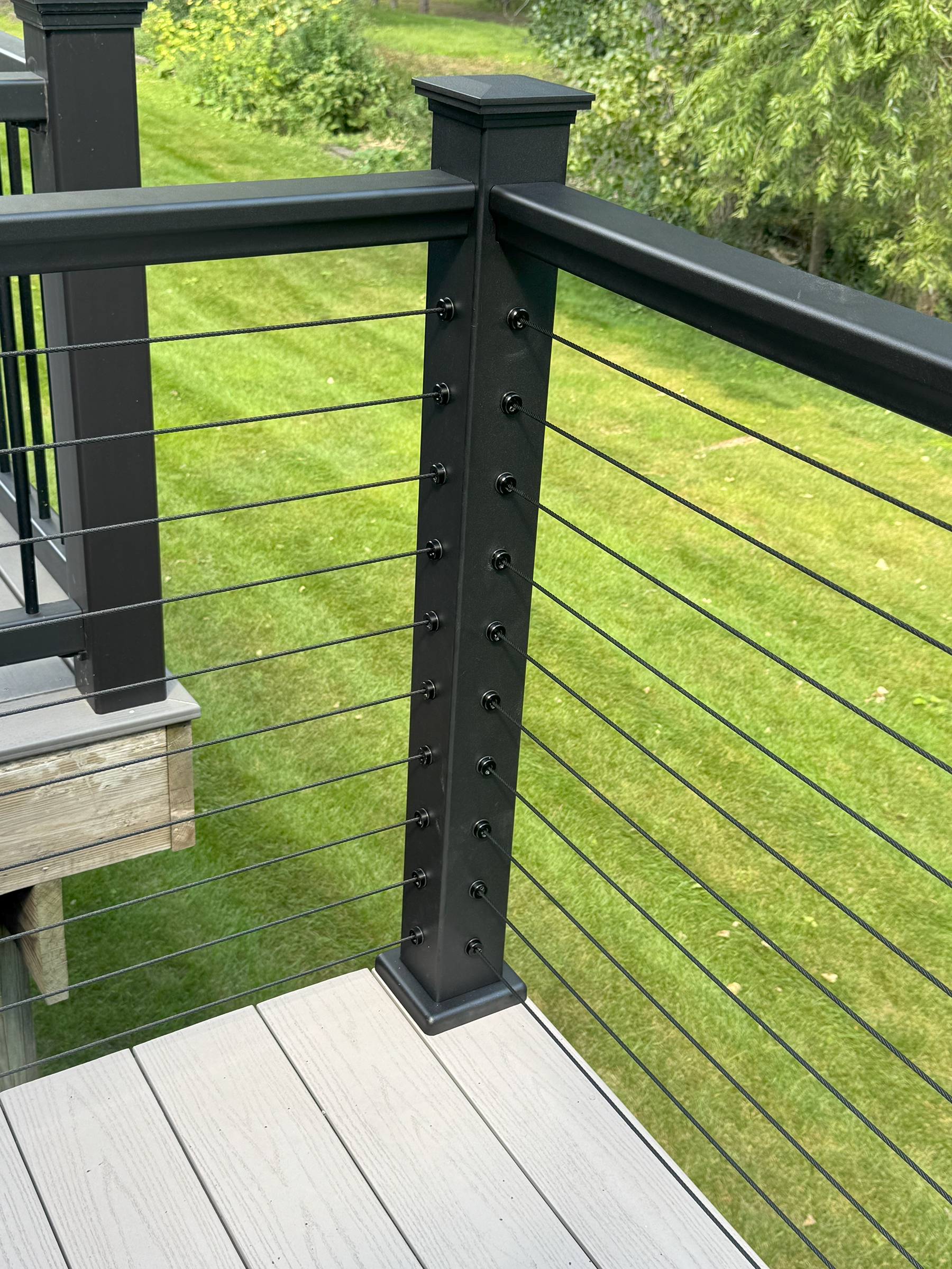 enEXO aluminum cable railing system on a deck